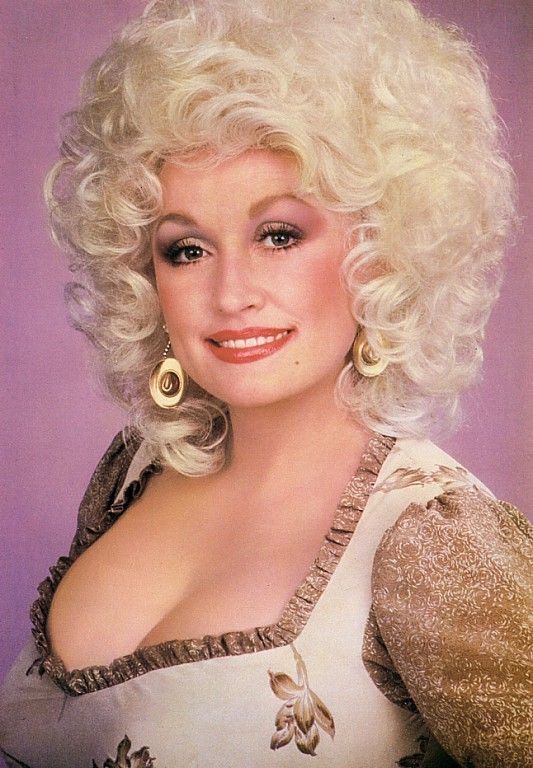 0. These sexy Dolly Parton bikini photos will... 