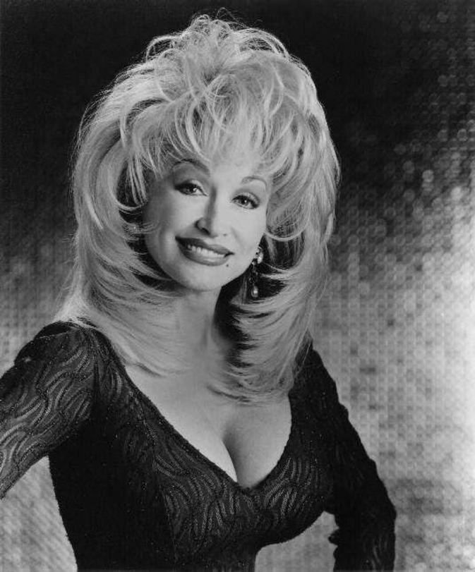 0. These sexy Dolly Parton bikini photos will... 