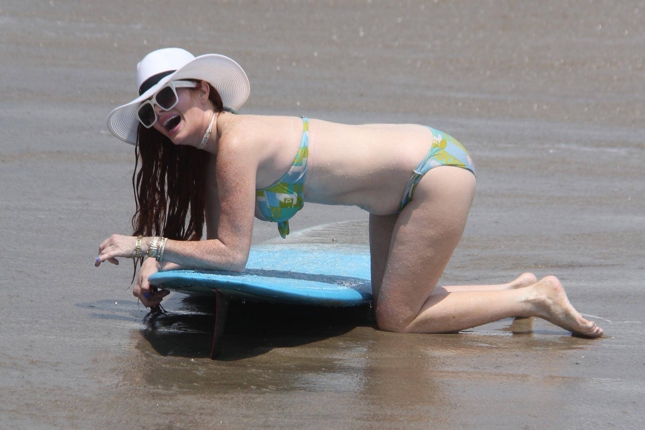 These sexy Phoebe Price bikini photos will make you wonder how someone so b...