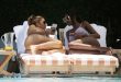 Bikini-clad Larsa Pippen and Kiki Barthlook Relax by the Pool in Miami